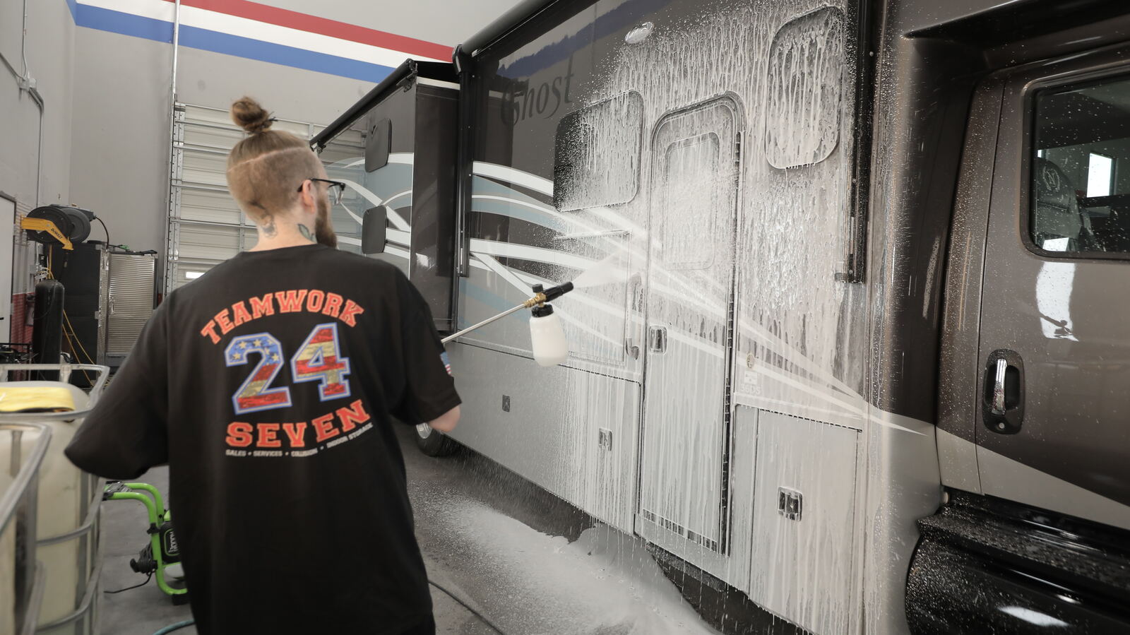 Foam washing the side of a Super C motorhome in our Las Vegas bay